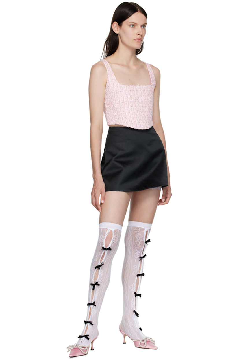 Handcrafted nylon and cotton-blend tweed corset-style camisole. Boning throughout.

· Square neck
· Fixed shoulder straps
· Lace-up closure at back
· Plain-woven lining

Available exclusively at SSENSE.

Supplier color: Pink tweed
