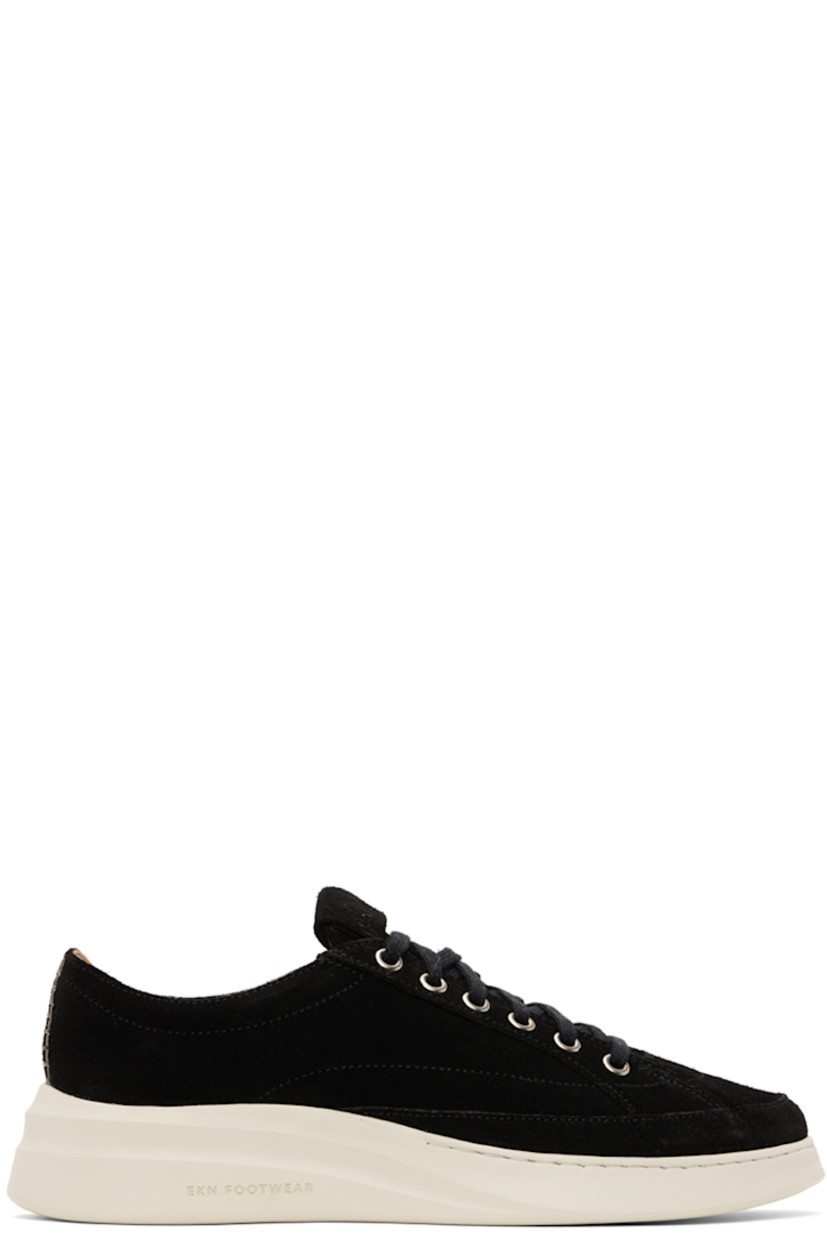 Low-top suede sneakers in black.

· Lace-up closure
· Logo embossed at padded tongue
· Padded collar
· Grained calfskin lining
· Treaded EVA foam rubber sole

Supplier color: Coal