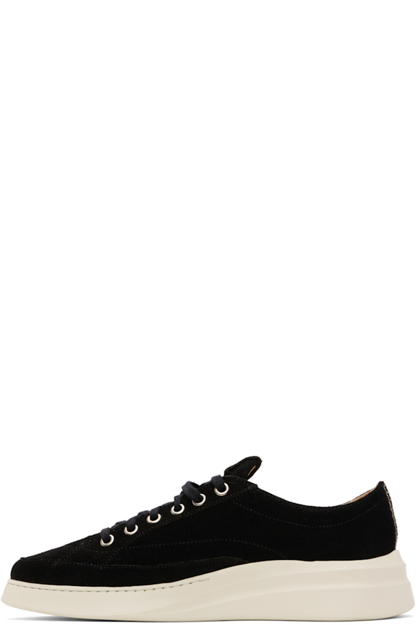 Low-top suede sneakers in black.

· Lace-up closure
· Logo embossed at padded tongue
· Padded collar
· Grained calfskin lining
· Treaded EVA foam rubber sole

Supplier color: Coal