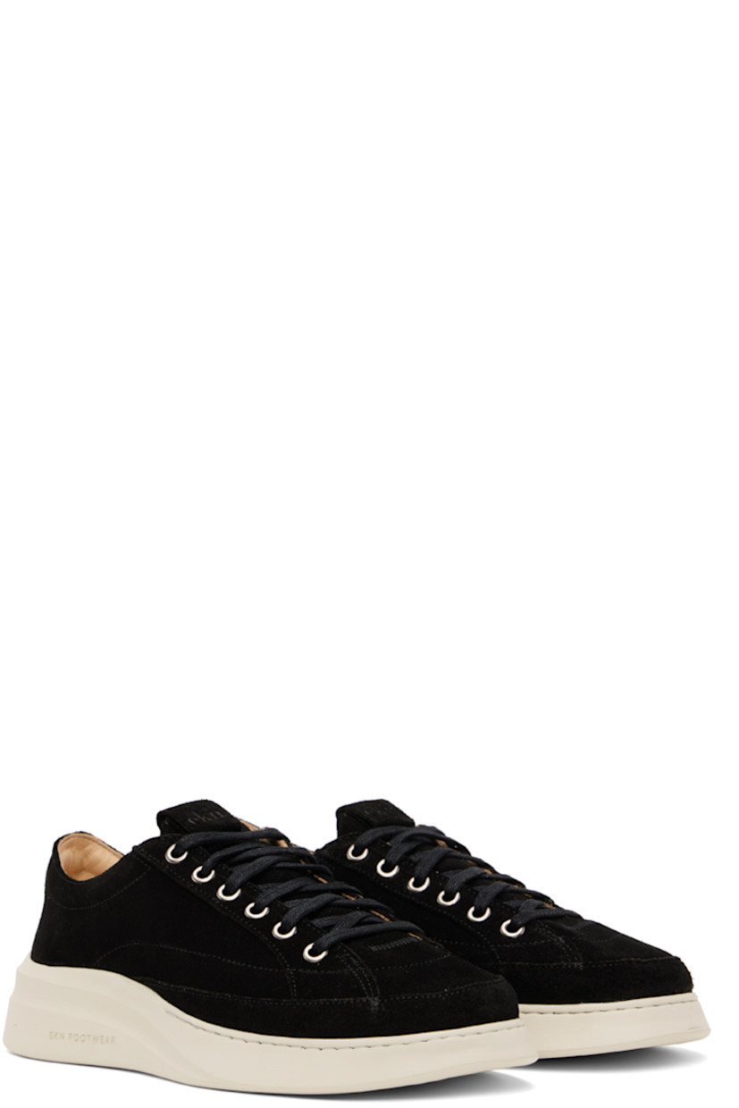 Low-top suede sneakers in black.

· Lace-up closure
· Logo embossed at padded tongue
· Padded collar
· Grained calfskin lining
· Treaded EVA foam rubber sole

Supplier color: Coal