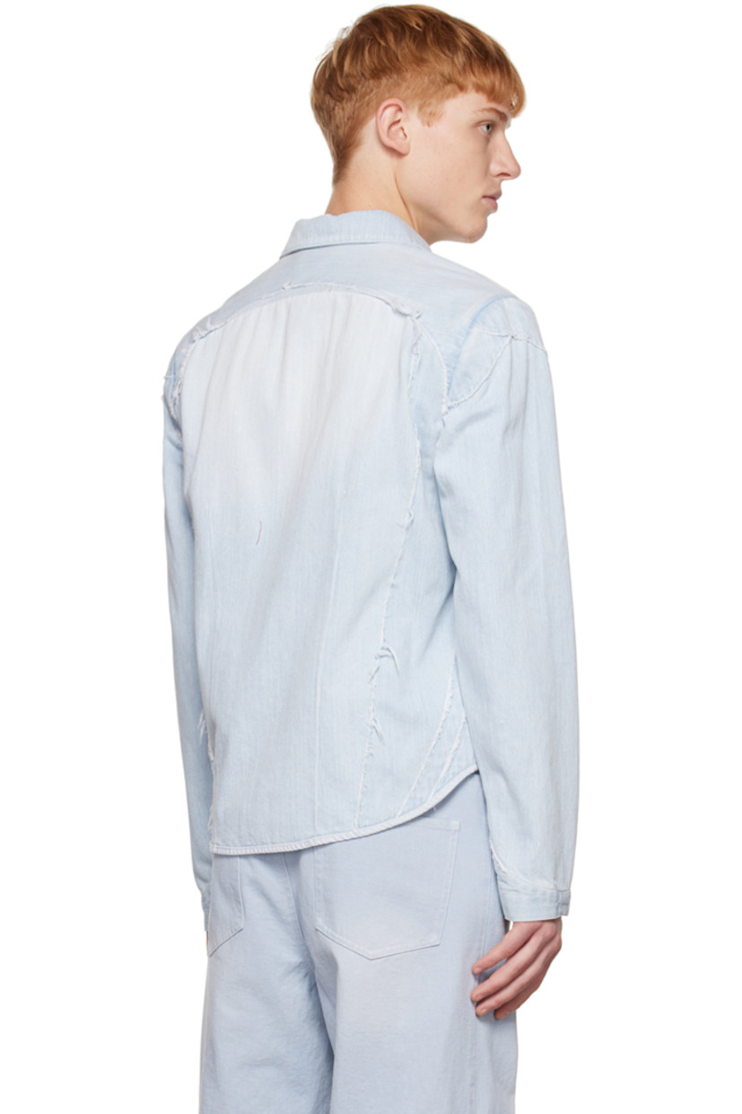 Non-stretch denim jacket. Distressing, exposed seams, and frayed trim throughout.

· Spread collar 
· Button closure
· Shirttail hem
· Unlined

Available exclusively at SSENSE.

Supplier color: Blue