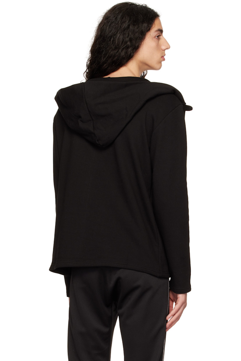 French terry hoodie.

· Layered construction
· Press-stud fastening at hood
· Cutout at front
· Graphic text printed at front

Available exclusively at SSENSE.

Supplier color: Black