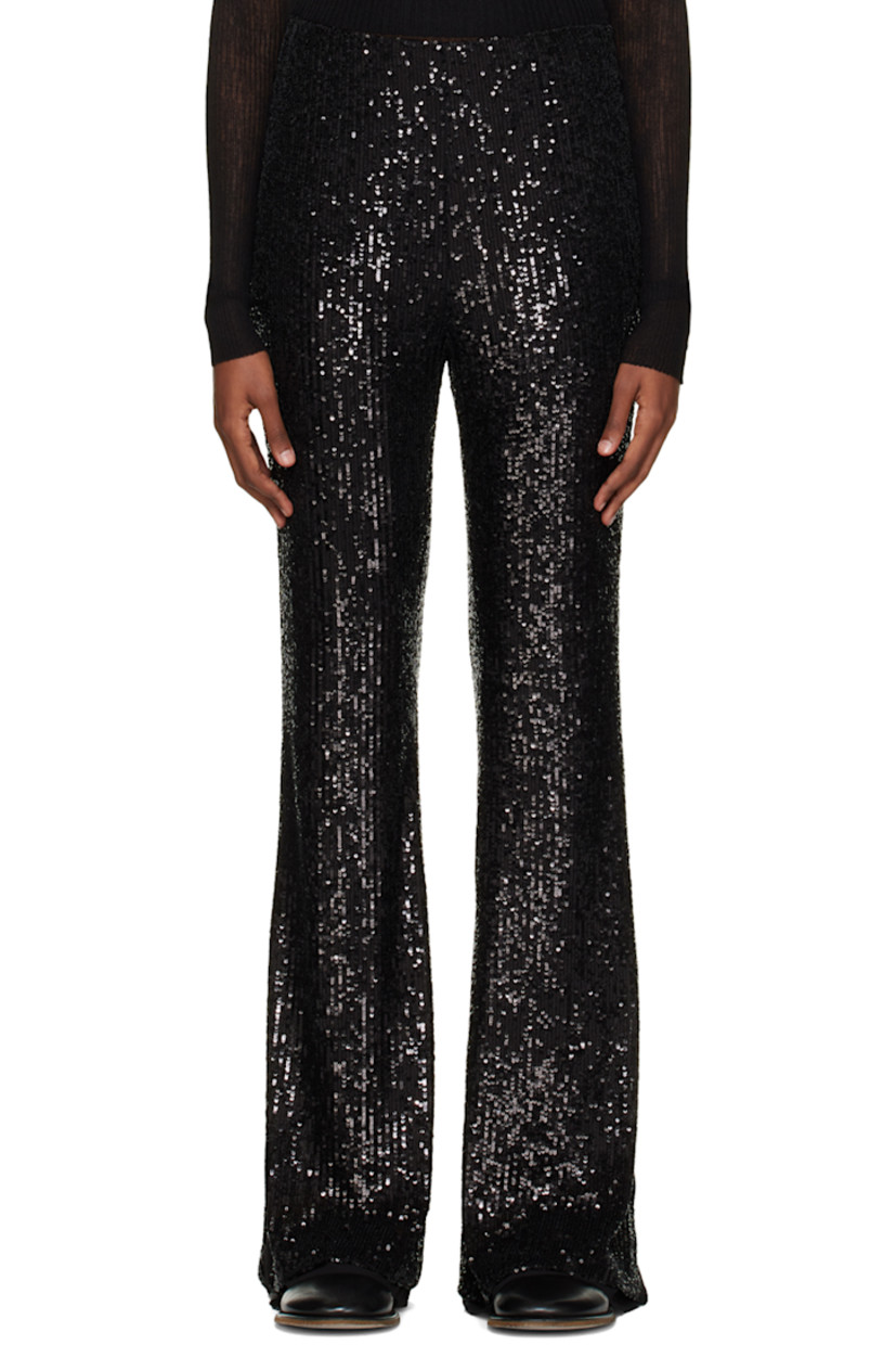 Mesh and sequin leggings.

· Concealed zip closure at side seam
· Vented and unfinished cuffs
· Full chiffon lining

Supplier color: Black