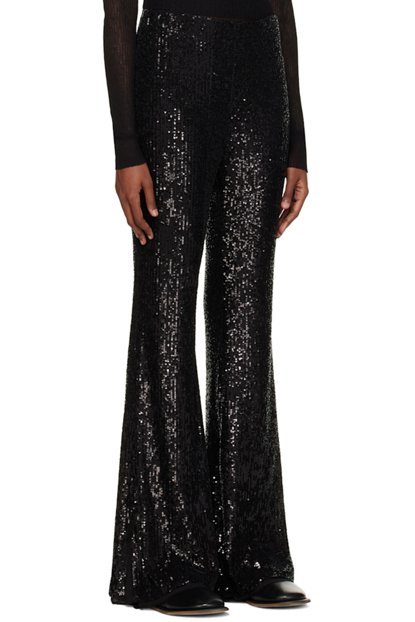 Mesh and sequin leggings.

· Concealed zip closure at side seam
· Vented and unfinished cuffs
· Full chiffon lining

Supplier color: Black