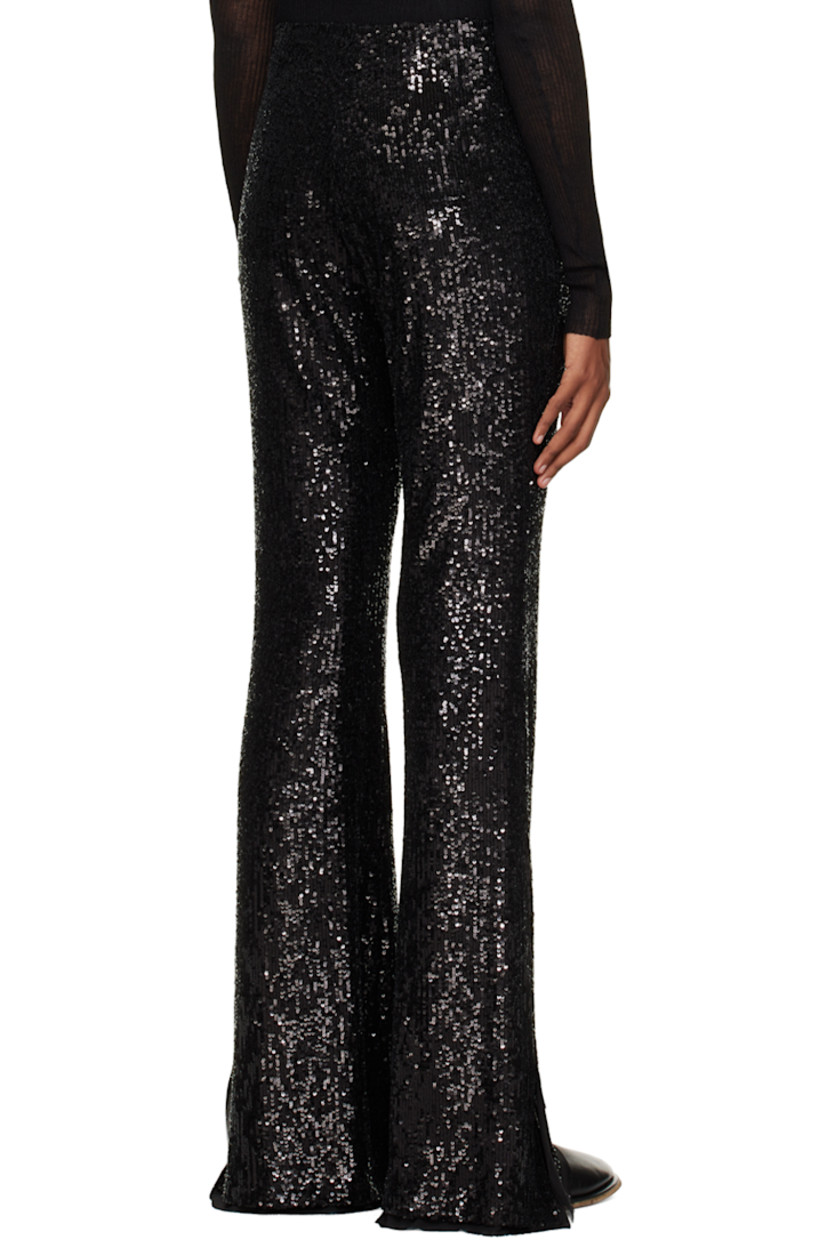 Mesh and sequin leggings.

· Concealed zip closure at side seam
· Vented and unfinished cuffs
· Full chiffon lining

Supplier color: Black