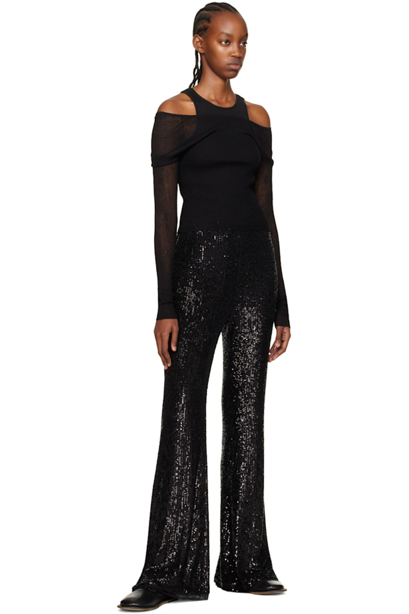 Mesh and sequin leggings.

· Concealed zip closure at side seam
· Vented and unfinished cuffs
· Full chiffon lining

Supplier color: Black