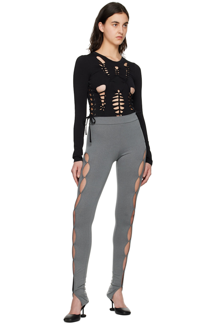 Stretch polyester jersey leggings. Vented side seams with hook-eye fastenings.

Supplier color: Gray