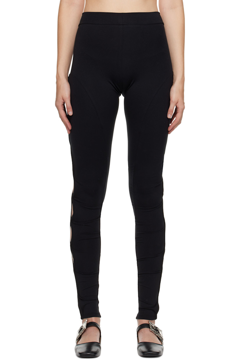 Stretch polyester jersey leggings. Vented side seams with hook-eye fastenings.

Supplier color: Black