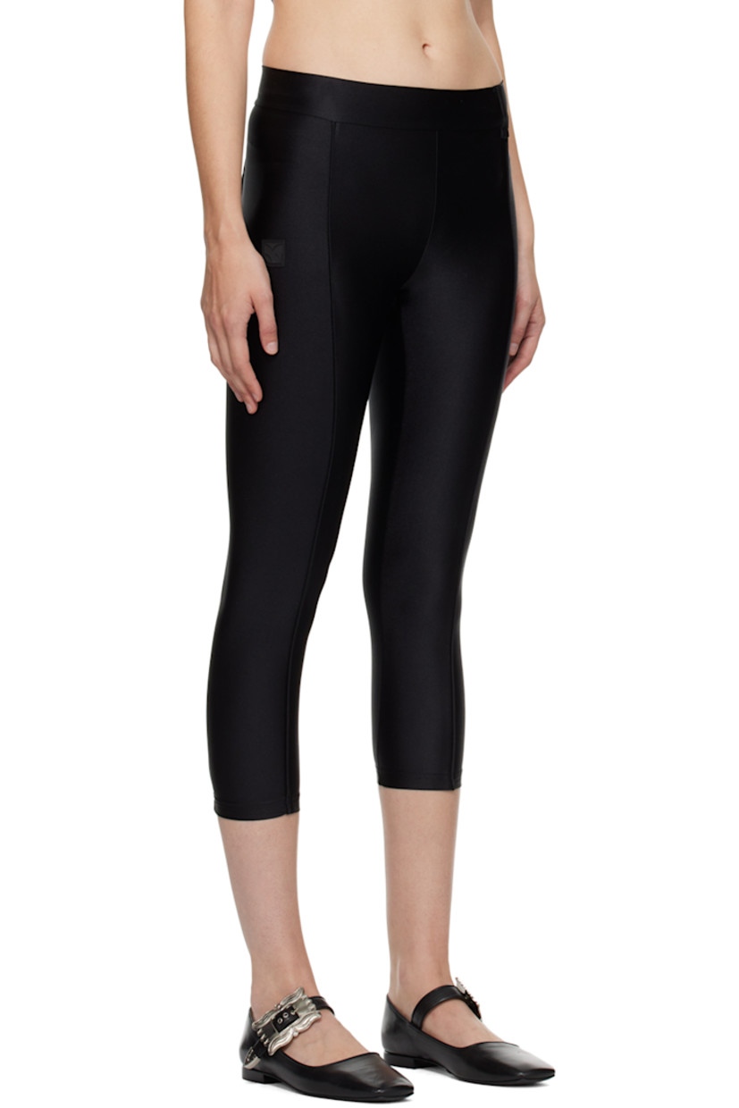 Stretch nylon jersey leggings.

· Piping throughout
· Rubberized logo patch at front

Supplier color: Black