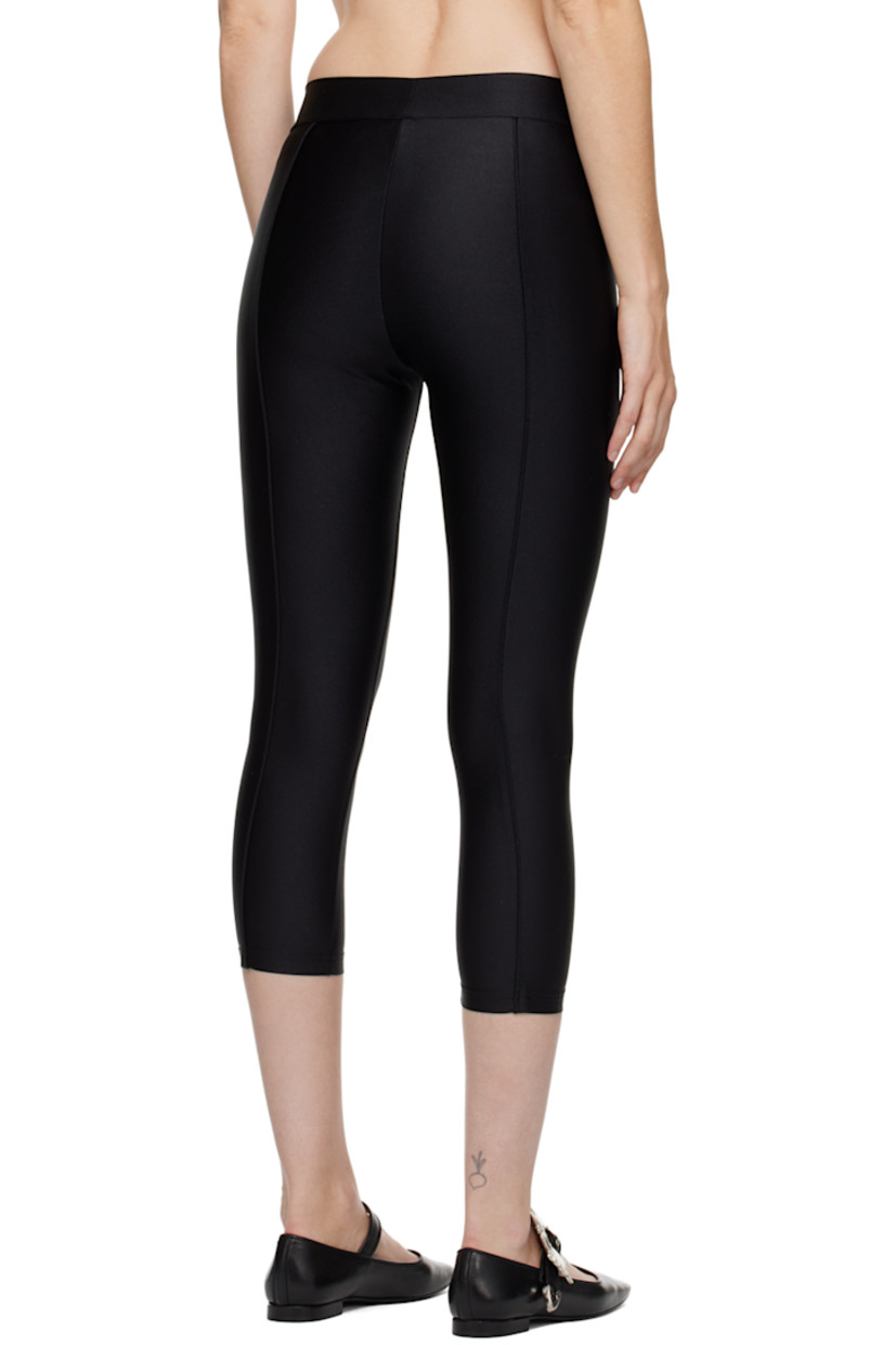 Stretch nylon jersey leggings.

· Piping throughout
· Rubberized logo patch at front

Supplier color: Black