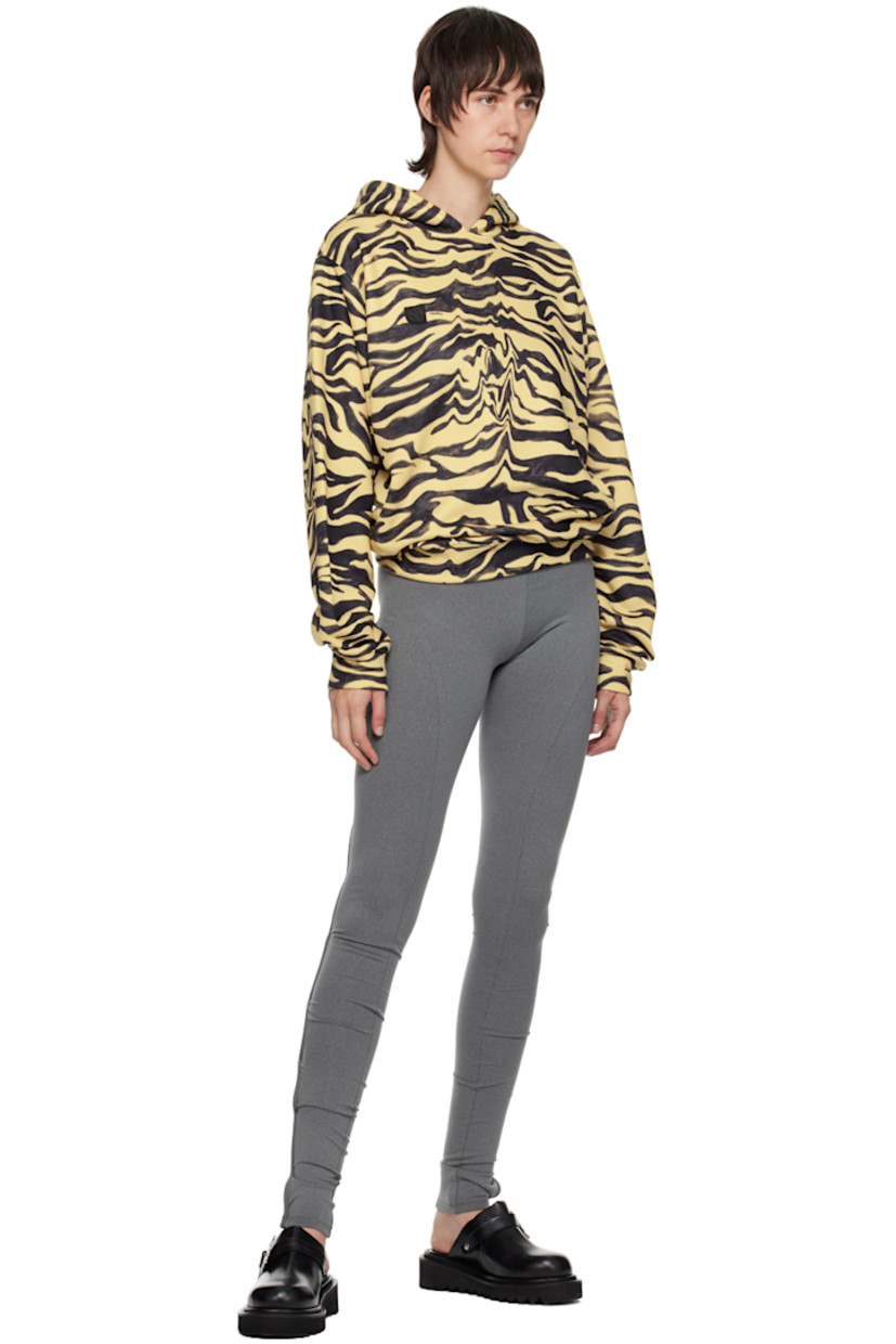 Cotton and polyester-blend fleece hoodie.

· Graphic pattern printed throughout
· Rubberized logo patch at front

Supplier color: Yellow