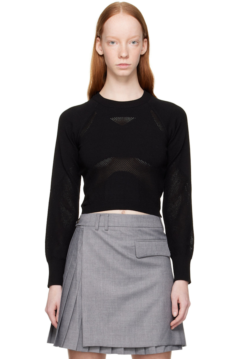 Knit rayon-blend jersey sport top. Perforated detailing throughout. 

· Rib knit crewneck, hem, and cuffs
· Raglan sleeves

Supplier color: Black