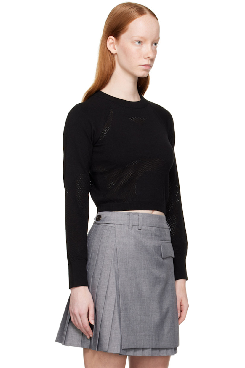Knit rayon-blend jersey sport top. Perforated detailing throughout. 

· Rib knit crewneck, hem, and cuffs
· Raglan sleeves

Supplier color: Black