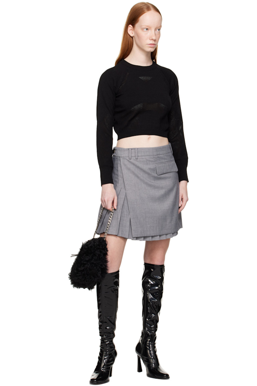 Knit rayon-blend jersey sport top. Perforated detailing throughout. 

· Rib knit crewneck, hem, and cuffs
· Raglan sleeves

Supplier color: Black