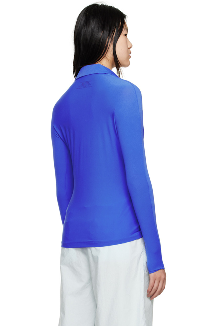 Stretch nylon jersey shirt. 

· Notched lapel
· Button closure

Supplier color: Light