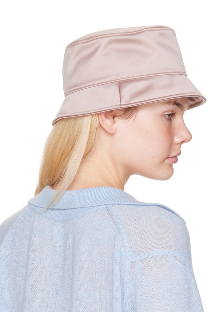 Handcrafted technical silk beach hat in purple. Logo hardware at face.

· Grosgrain browband  
· Plain-woven cotton lining 
· Contrast stitching in white

Supplier color: Lila