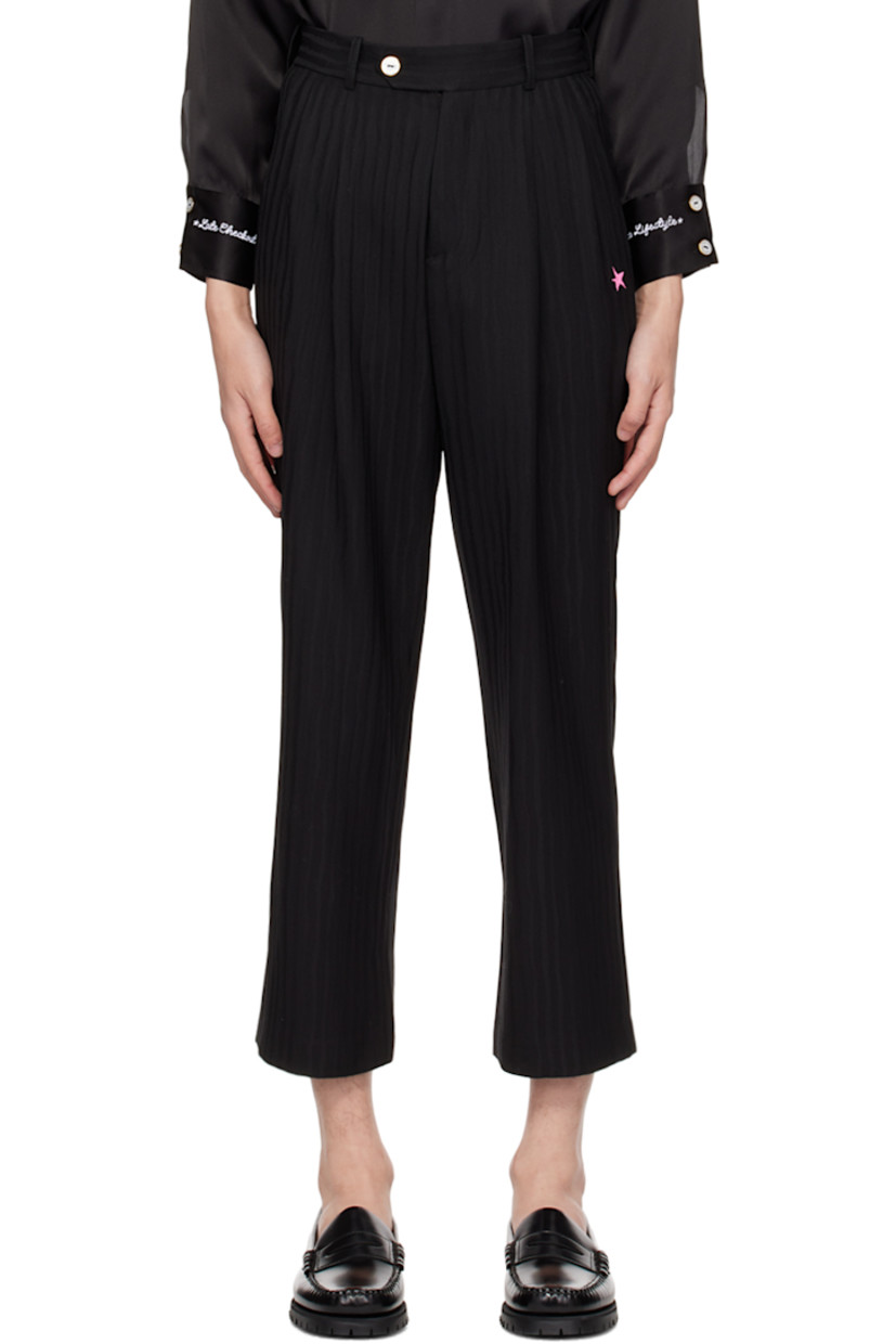 Virgin wool broken twill trousers.

· Belt loops 
�· Four-pocket styling
· Zip-fly 
· Pleats at front waistband
· Graphic embroidered at leg

Part of The Rockstar collection. 

Supplier color: Black