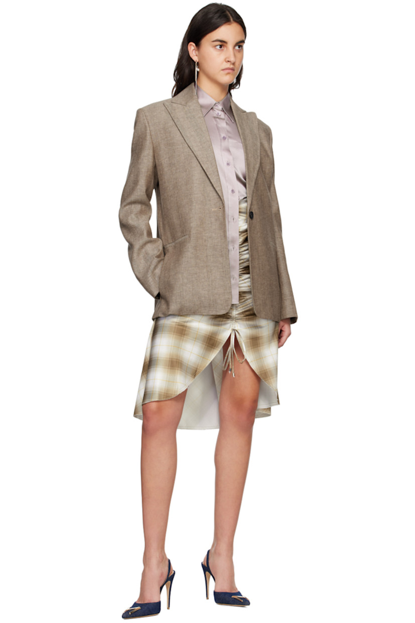 Linen-blend twill blazer. Stripes throughout. 

· Peaked lapel
· Button closure
· Welt pockets and zip pockets at waist
· Padded shoulders
· Unfinished surgeon's cuffs
· Central vent at back hem
· Welt pockets at interior
· Full plain-woven lining

Supplier color: Melange brown