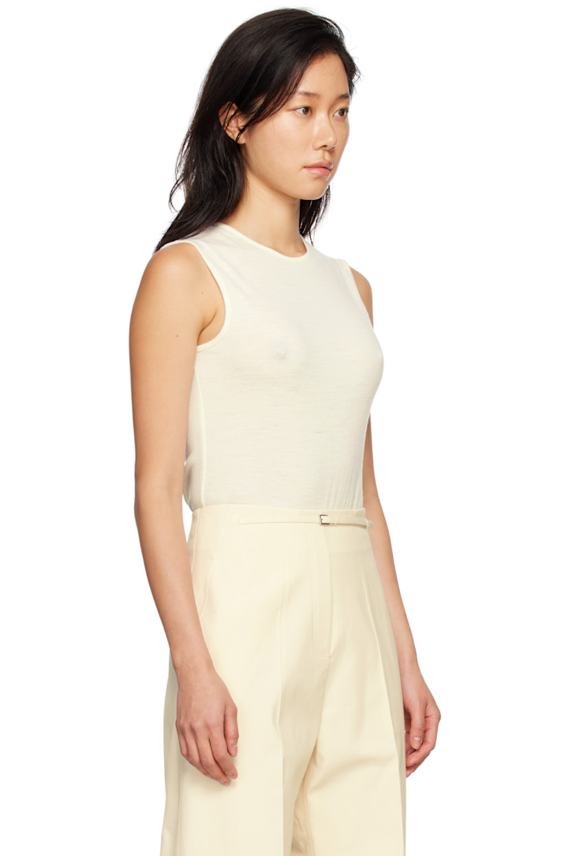 Wool jersey bodysuit.

· Crewneck
· Press-stud closure at bottom
· Partially lined

Supplier color: Cream