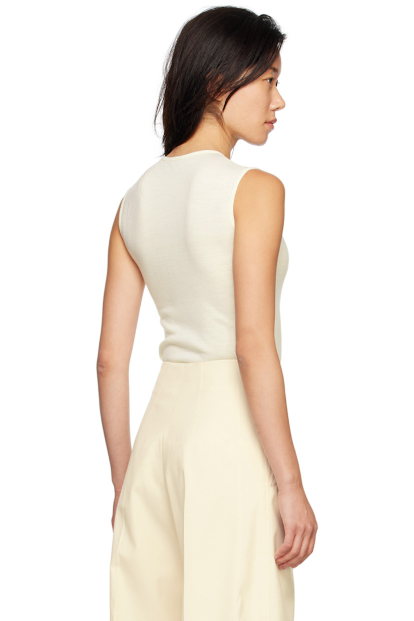 Wool jersey bodysuit.

· Crewneck
· Press-stud closure at bottom
· Partially lined

Supplier color: Cream