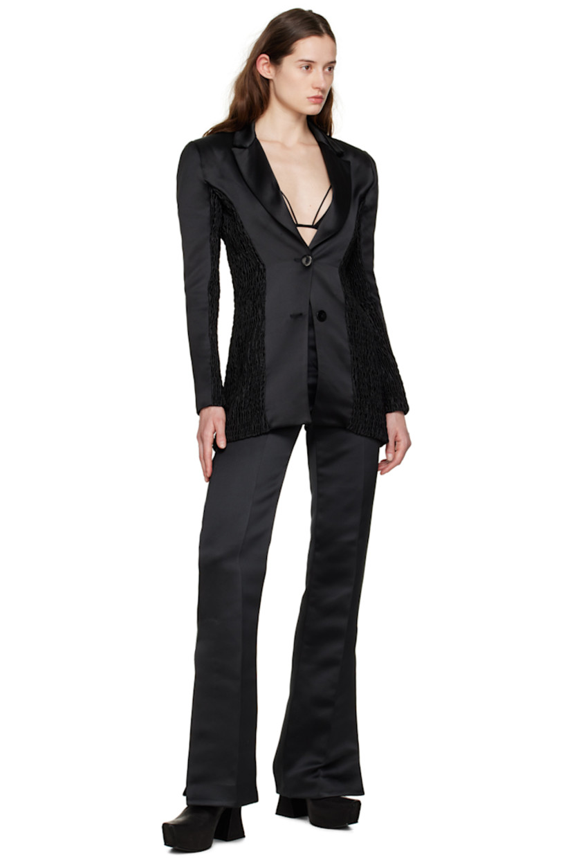 Stretch cotton and viscose-blend satin trousers.

· Zip-fly
· Central creases at front and back legs
· Vents at cuffs
· Darts at back waistband

Supplier color: Black