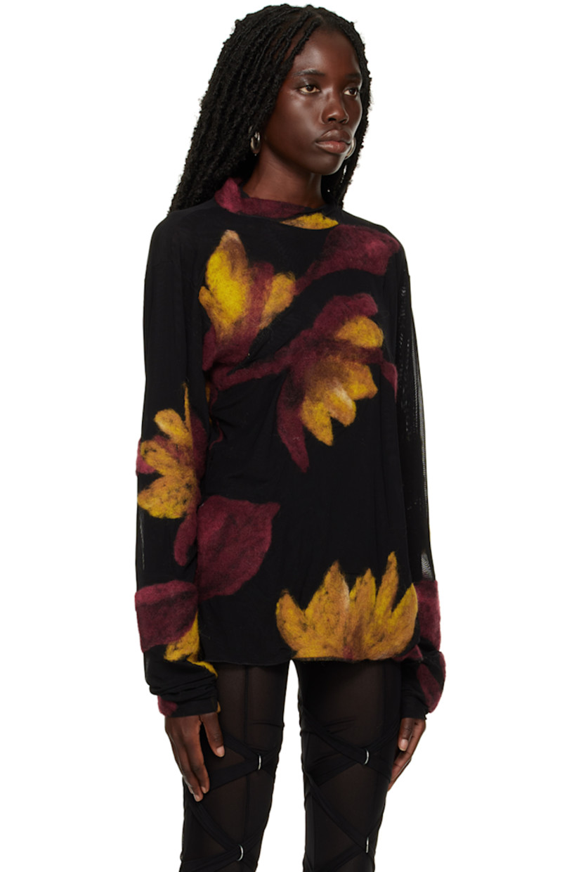 Semi-sheer polyester mesh sweater. Graphic felted appliqués throughout. 

· Crewneck 
· Full mesh lining 

Supplier color: Multi