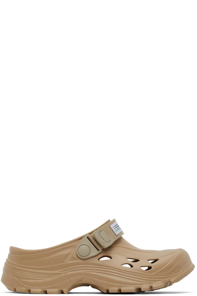 Recycled EVA rubber slippers in beige.

· Velcro strap at vamp
· Cut-outs at sides 
· Logo embossed at molded rubber footbed 
· Treaded rubber sole 

Supplier color: Beige