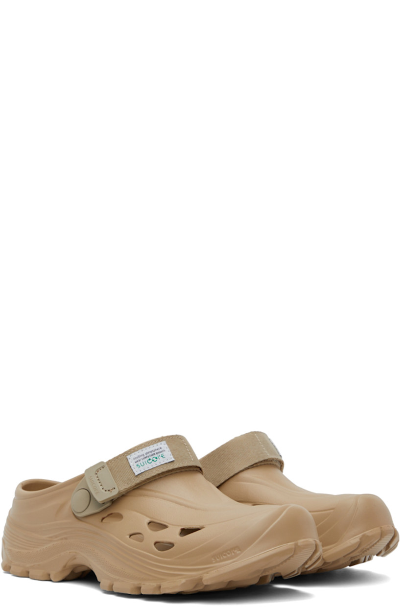 Recycled EVA rubber slippers in beige.

· Velcro strap at vamp
· Cut-outs at sides 
· Logo embossed at molded rubber footbed 
· Treaded rubber sole 

Supplier color: Beige