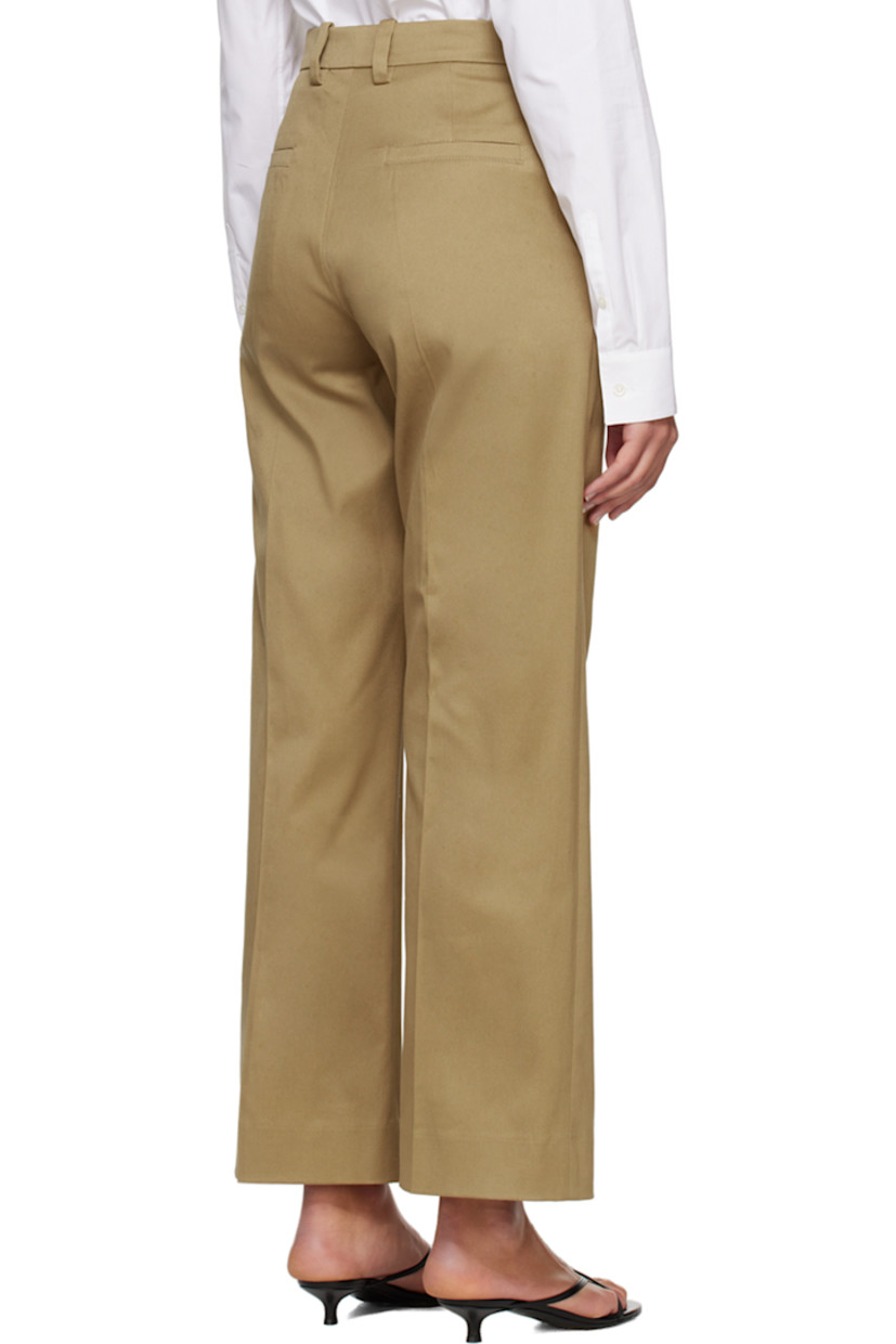 Straight-leg stretch cotton twill trousers.

· Belt loops
· Four-pocket styling
· Zip-fly
· Central creases at front and back

Wholesale exclusivity at SSENSE.

Supplier color: Beige