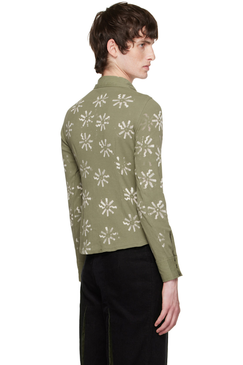 Rib knit stretch cotton shirt. Bleached floral pattern throughout.

· Cotton canvas trim at spread collar and cuffs
· Button closure
· Cutouts at front
· Shirttail hem
· Saddle shoulders
· Two-button barrel cuffs
· Mother-of-pearl hardware

Each item is unique. Please note coloration may vary.

Available exclusively at SSENSE.

Supplier color: Green/Cream
