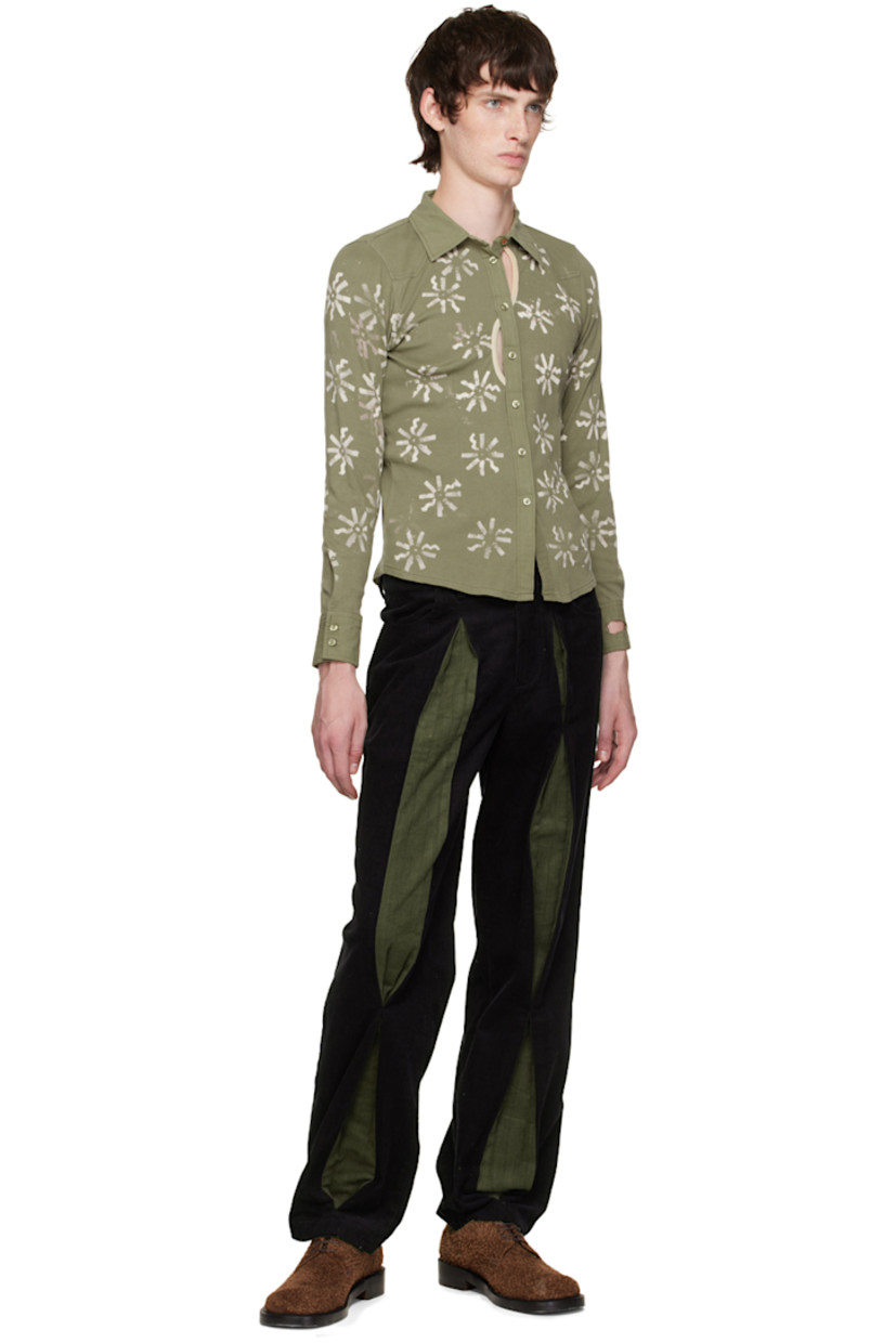 Rib knit stretch cotton shirt. Bleached floral pattern throughout.

· Cotton canvas trim at spread collar and cuffs
· Button closure
· Cutouts at front
· Shirttail hem
· Saddle shoulders
· Two-button barrel cuffs
· Mother-of-pearl hardware

Each item is unique. Please note coloration may vary.

Available exclusively at SSENSE.

Supplier color: Green/Cream