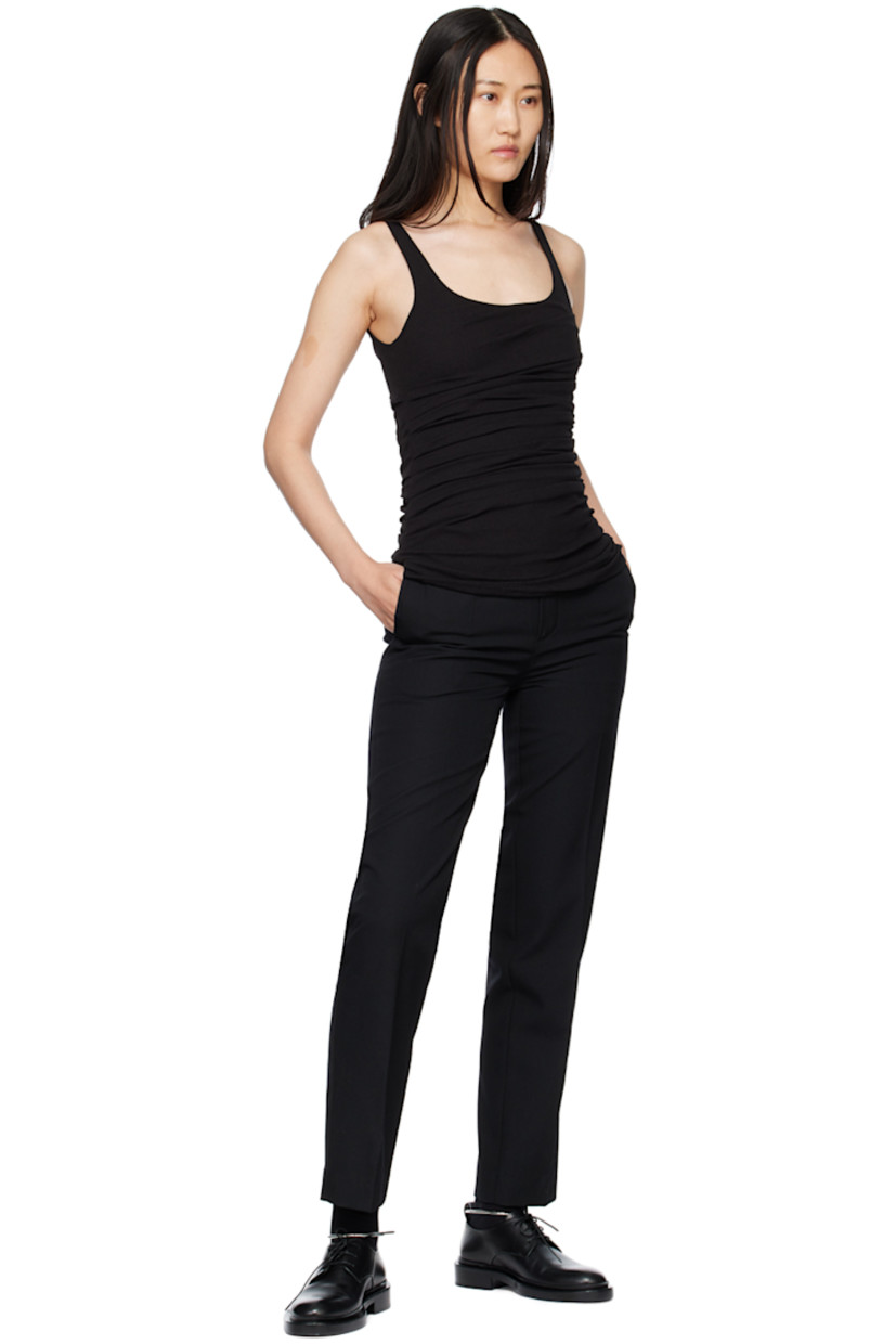 Rib knit nylon tank top. 

· Scoop neck 
· Ruching at side seams

Supplier color: Black