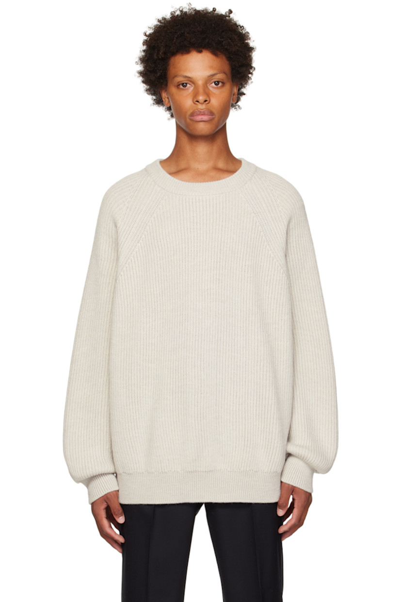 Rib knit virgin wool sweater.

· Crewneck 
· Raglan sleeves 

Supplier color: Sand