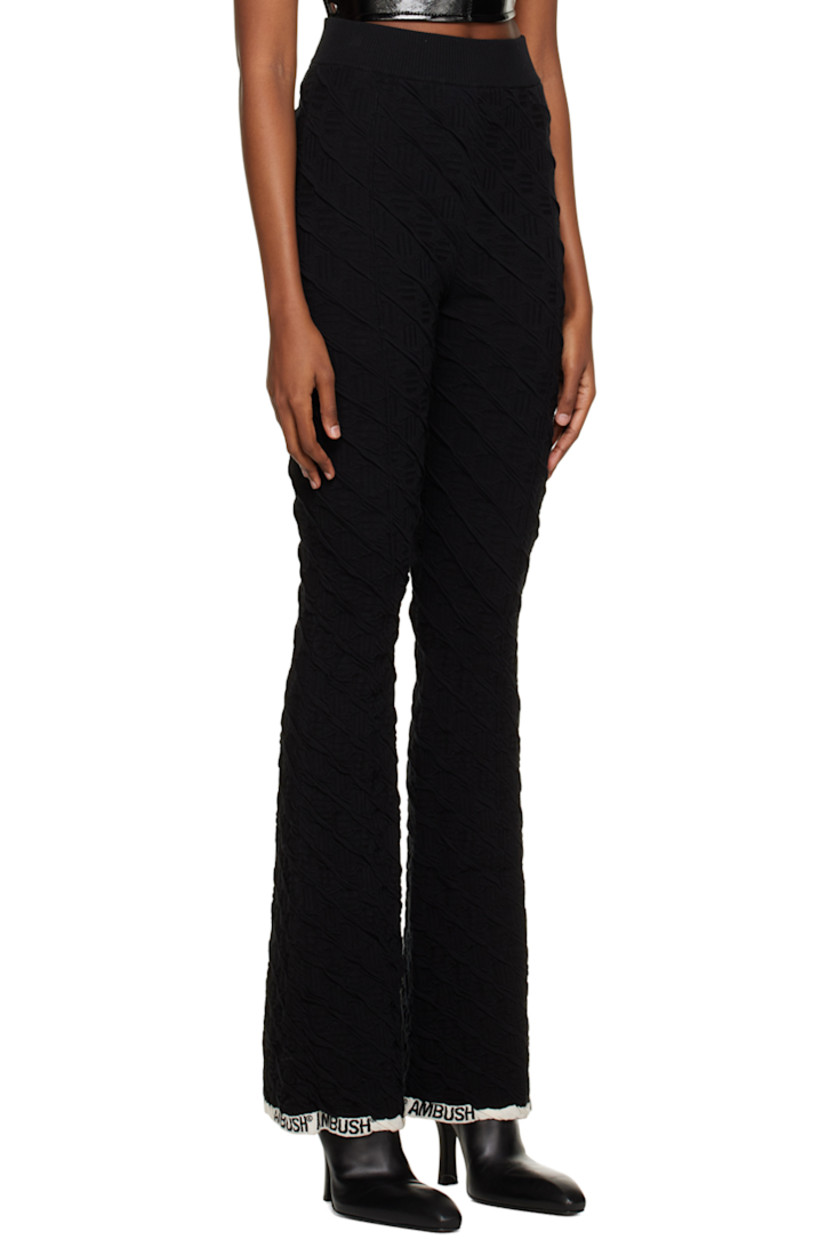 Flared stretch cotton and nylon-blend jersey lounge pants. Pleats and embroidered graphic pattern throughout.

· High-rise
· Logo embroidered at cuffs

Supplier color: Black