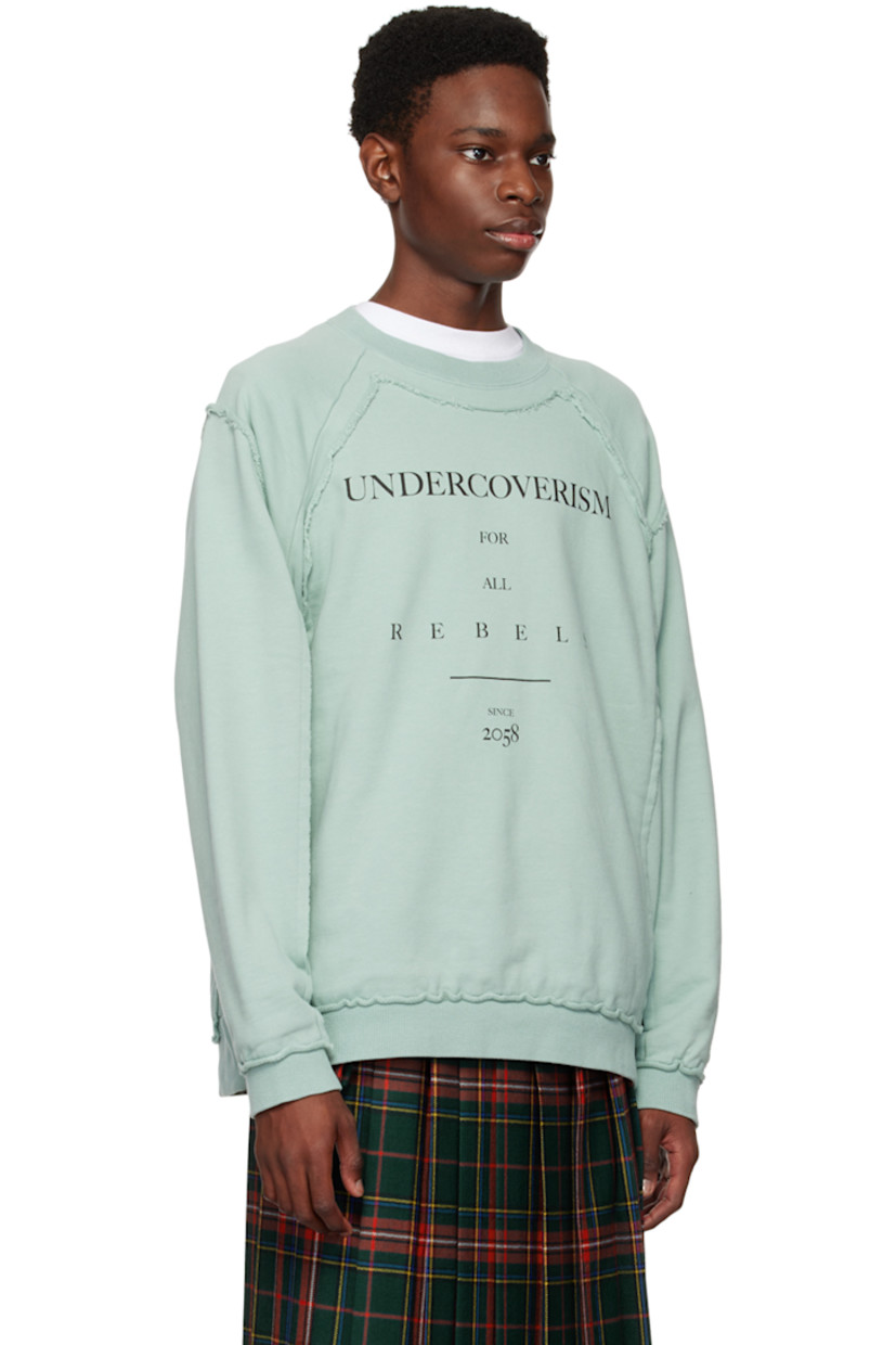 French terry sweatshirt. Raw edges throughout.

· Paneled construction
· Rib knit crewneck, hem, and cuffs
· Logo and text printed at front 
· Seam pockets

Supplier color: Peppermint