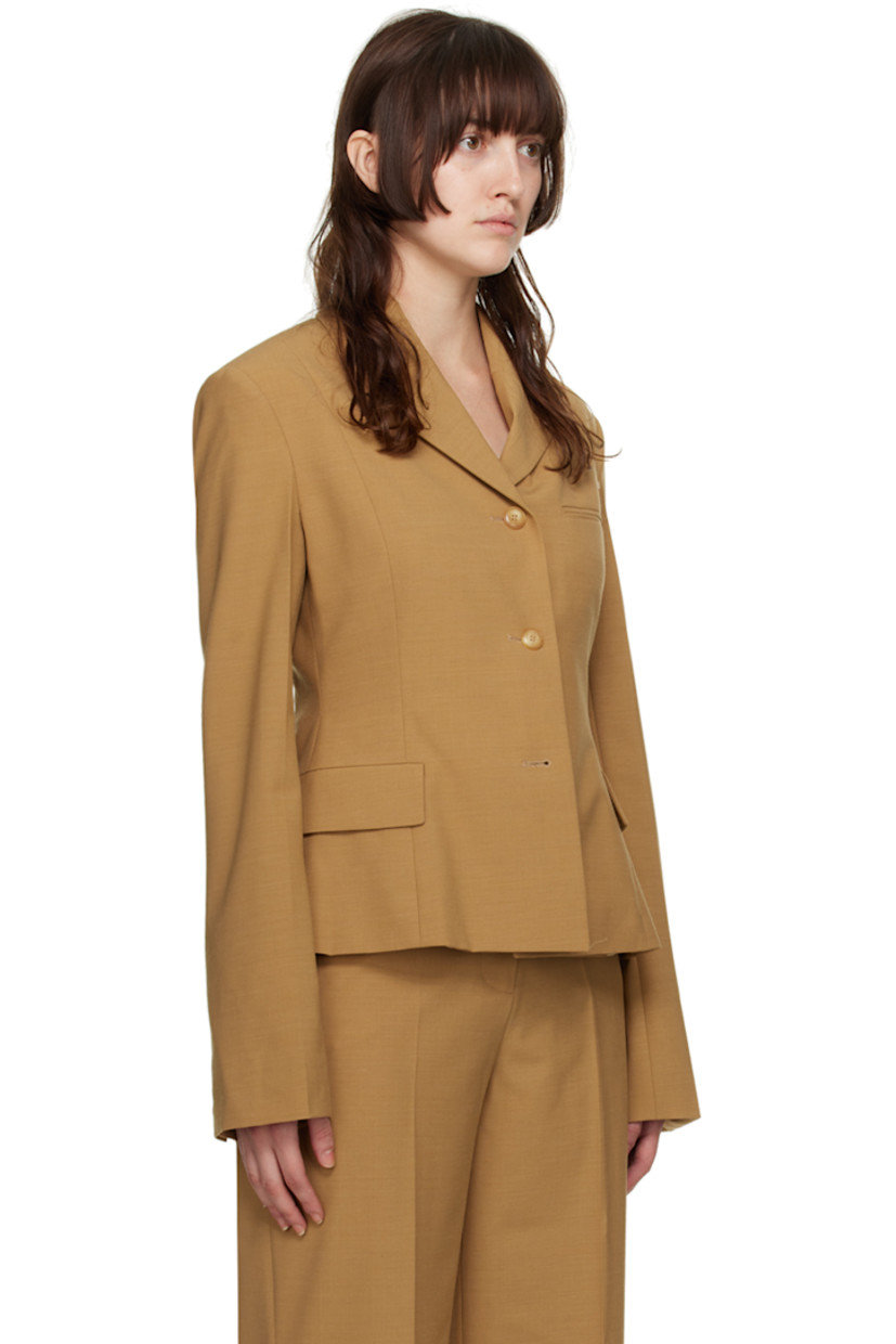 Plain-woven modal-blend blazer.

· Notched lapel
· Button closure
· Welt pocket at chest
· Flap pockets at waist
· Four-button surgeon's cuffs
· Central vent at back hem
· Full viscose satin lining

Supplier color: Camel