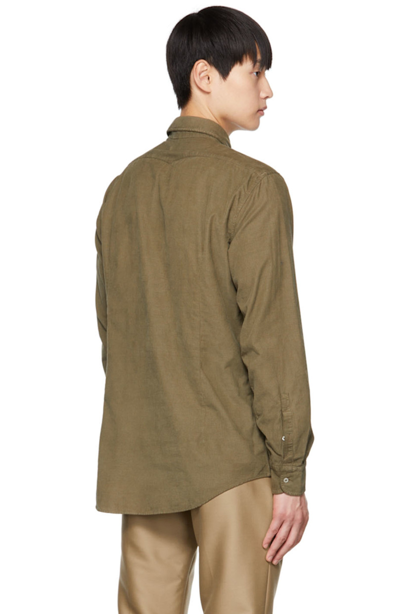Watercolor-dyed cotton corduroy shirt. 

· Spread collar 
· Button closure 
· Logo embroidered at front
· Curved hem 
· Two-button barrel cuffs 
· Mother-of-pearl hardware 

Supplier color: Military