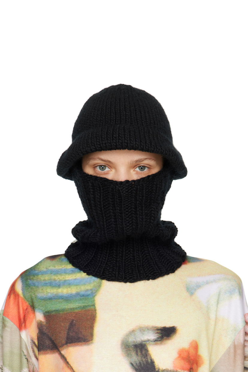 Rib knit wool beanie in black.

· Integrated mask-style panel at brim
· Single press-stud at collar
· Logo-engraved silver-tone hardware

Face masks and face coverings are final sale and are not eligible for return or exchange.

Supplier color: Black