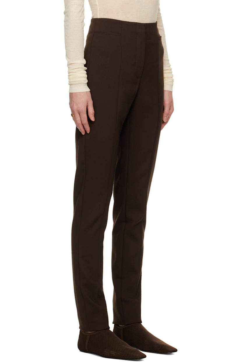 Slim-fit stretch polyester and viscose-blend twill trousers.

· High-rise
· Four-pocket styling
· Zip-fly
· Pinched seam at front and back

Supplier color: Chocolate