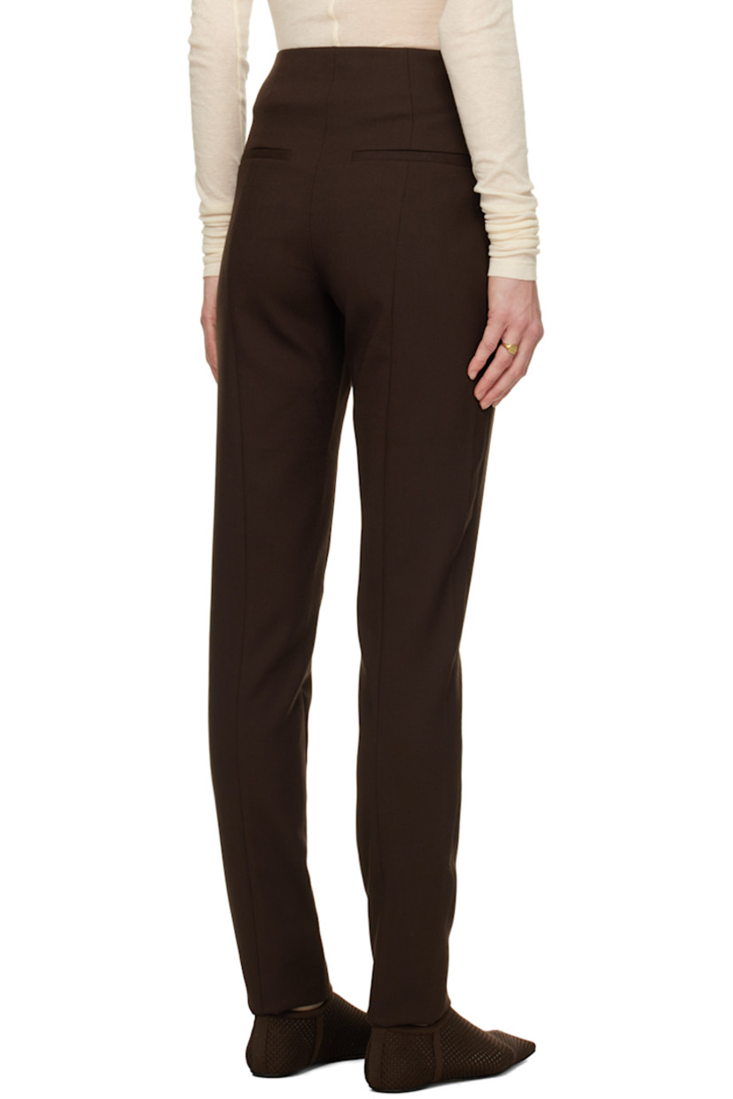 Slim-fit stretch polyester and viscose-blend twill trousers.

· High-rise
· Four-pocket styling
· Zip-fly
· Pinched seam at front and back

Supplier color: Chocolate