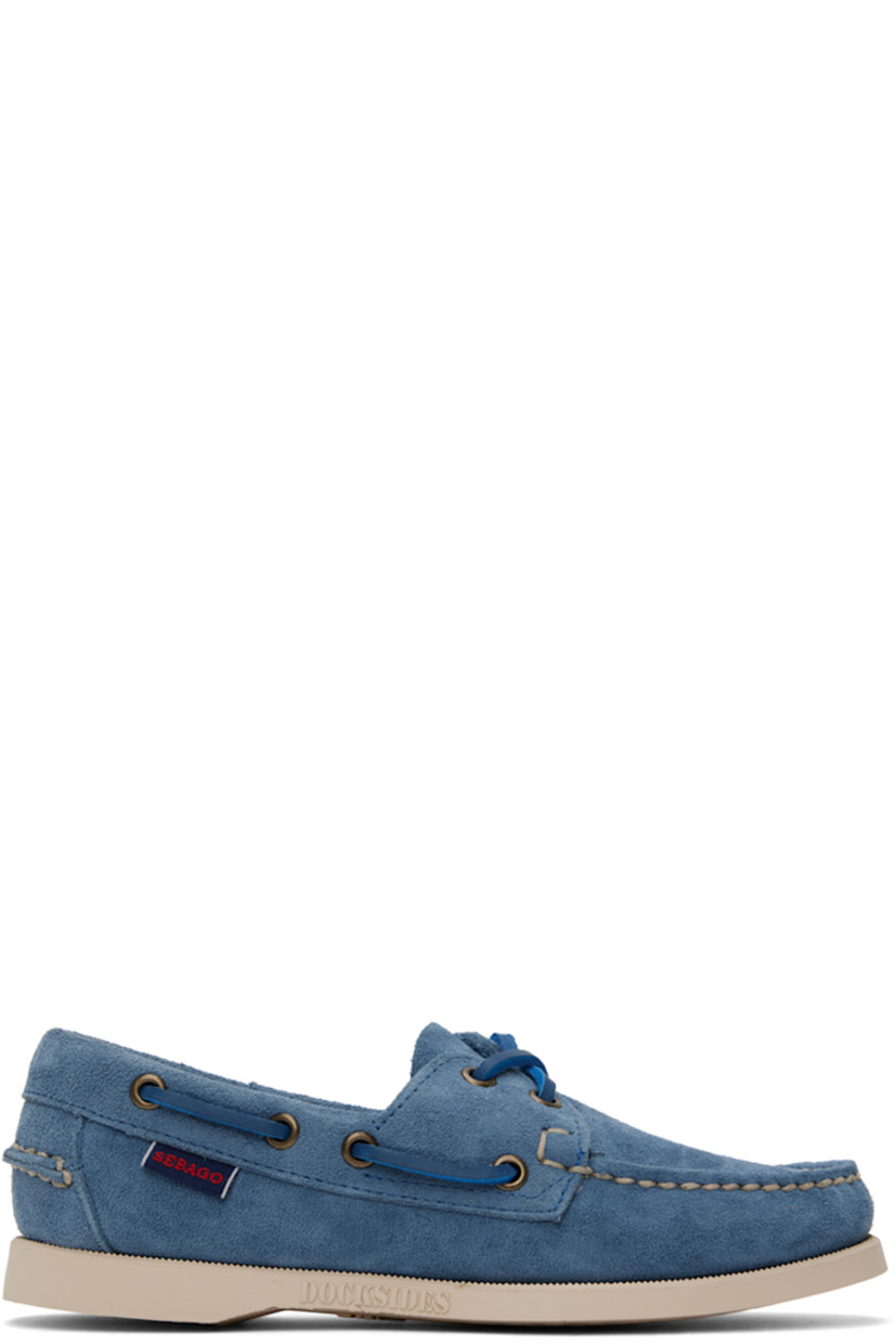 Handcrafted suede oxfords in indigo.

· Round moc toe
· Lace-up closure
· Padded collar
· Textile logo flag at outer side
· Logo embossed at midsole in off-white
· Treaded anti-slip rubber outsole in off-white

Supplier color: Indigo