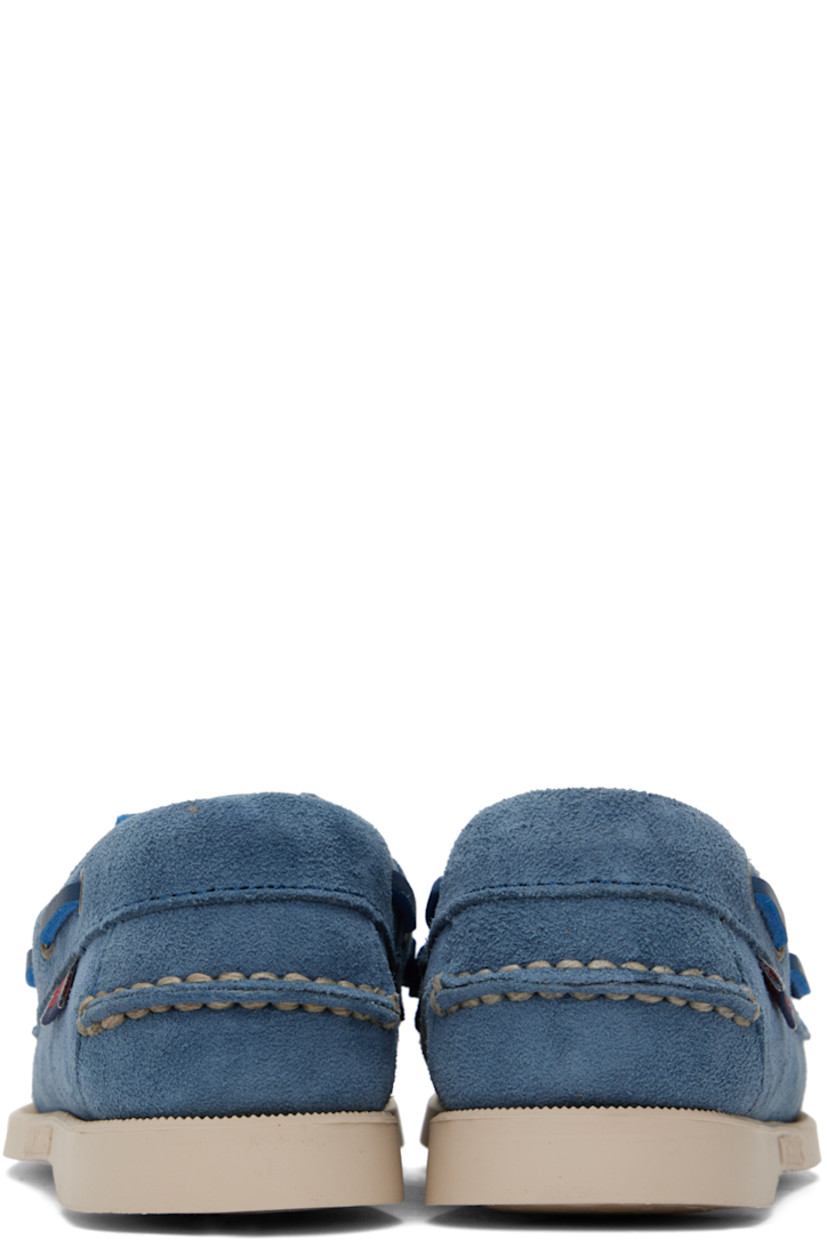 Handcrafted suede oxfords in indigo.

· Round moc toe
· Lace-up closure
· Padded collar
· Textile logo flag at outer side
· Logo embossed at midsole in off-white
· Treaded anti-slip rubber outsole in off-white

Supplier color: Indigo