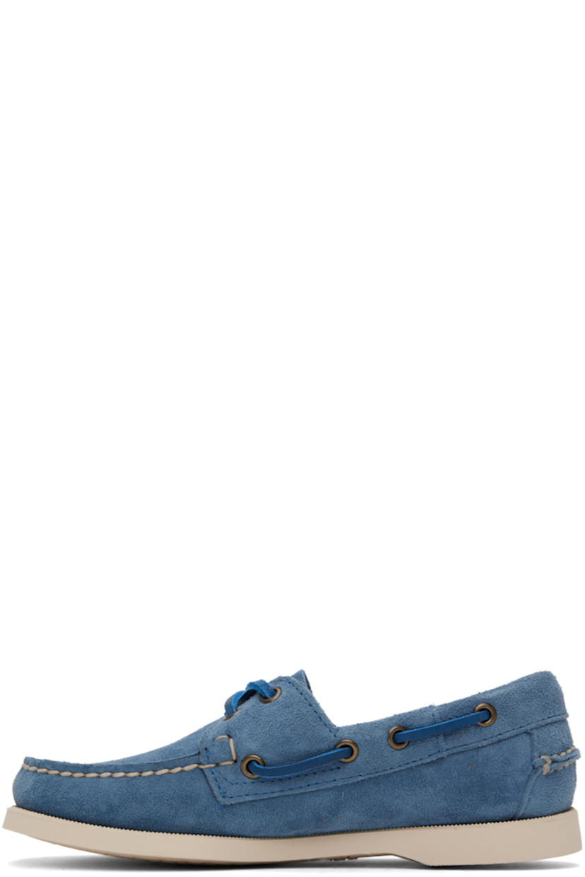 Handcrafted suede oxfords in indigo.

· Round moc toe
· Lace-up closure
· Padded collar
· Textile logo flag at outer side
· Logo embossed at midsole in off-white
· Treaded anti-slip rubber outsole in off-white

Supplier color: Indigo