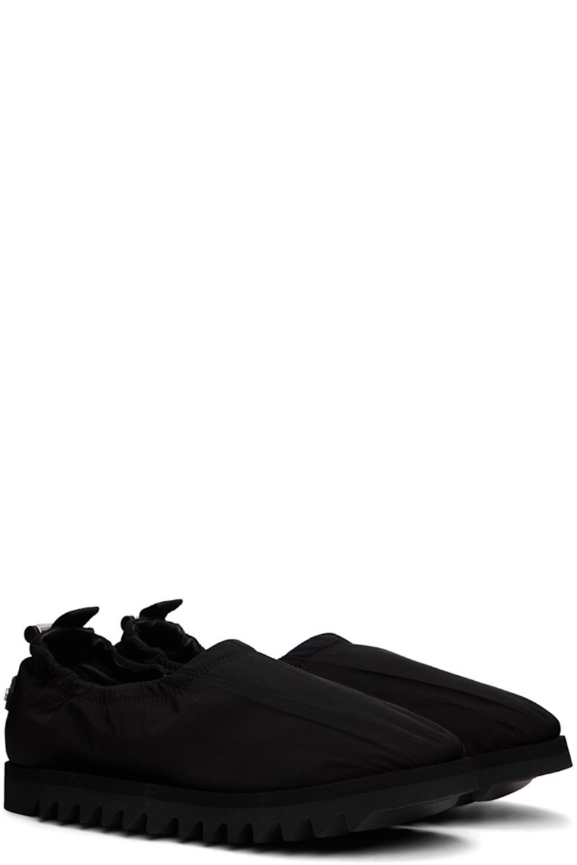 Nylon twill loafers in black. Logo appliqué at heel counter.

· Pleats at vamp
· Pull-loop and cord-lock drawstring at heel collar
· Grained leather lining
· Treaded Vibram® foam rubber sole

Supplier color: Black
