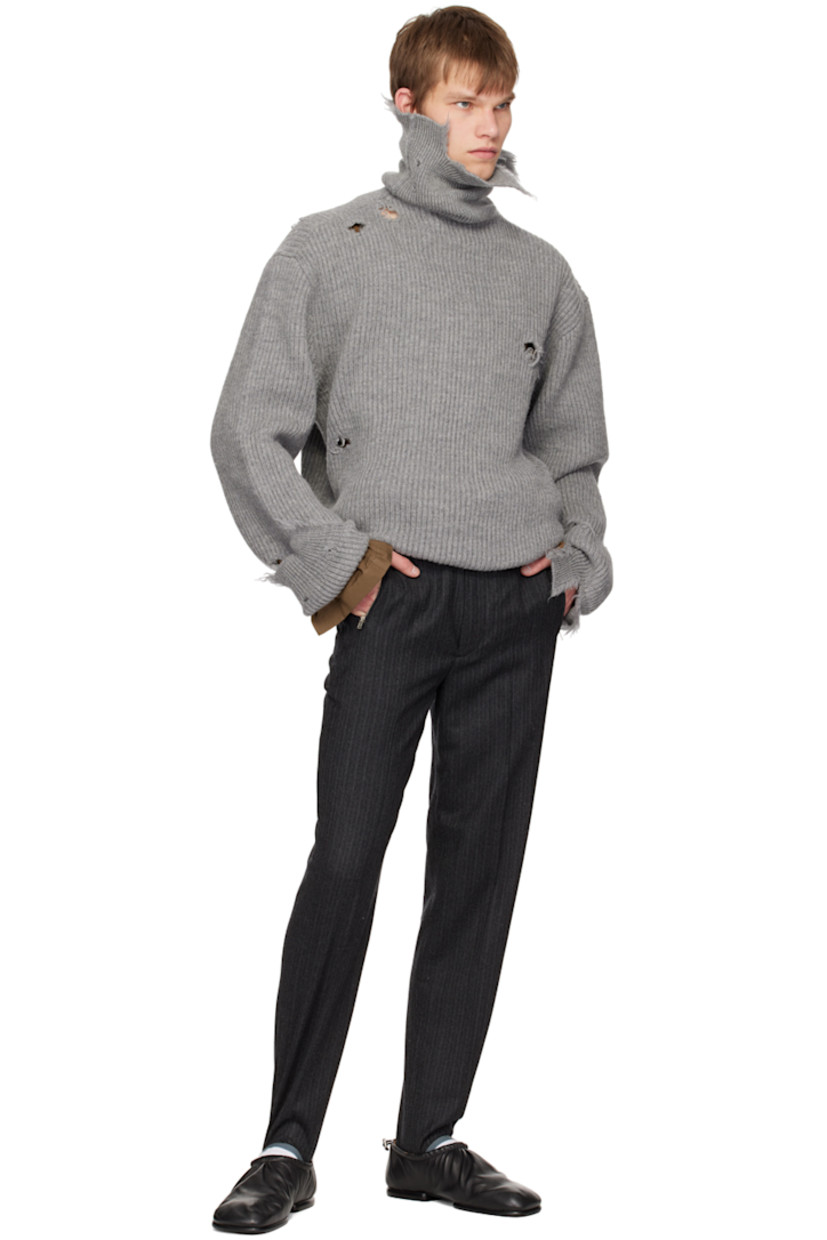 Virgin wool twill trousers. Stripes throughout.

· Belt loops
· Five-pocket styling
· Zip-fly
· Twin darts at front and back
· Central creases at front and back
· Stirrup at elasticized cuffs

Supplier color: Gray pinstripe