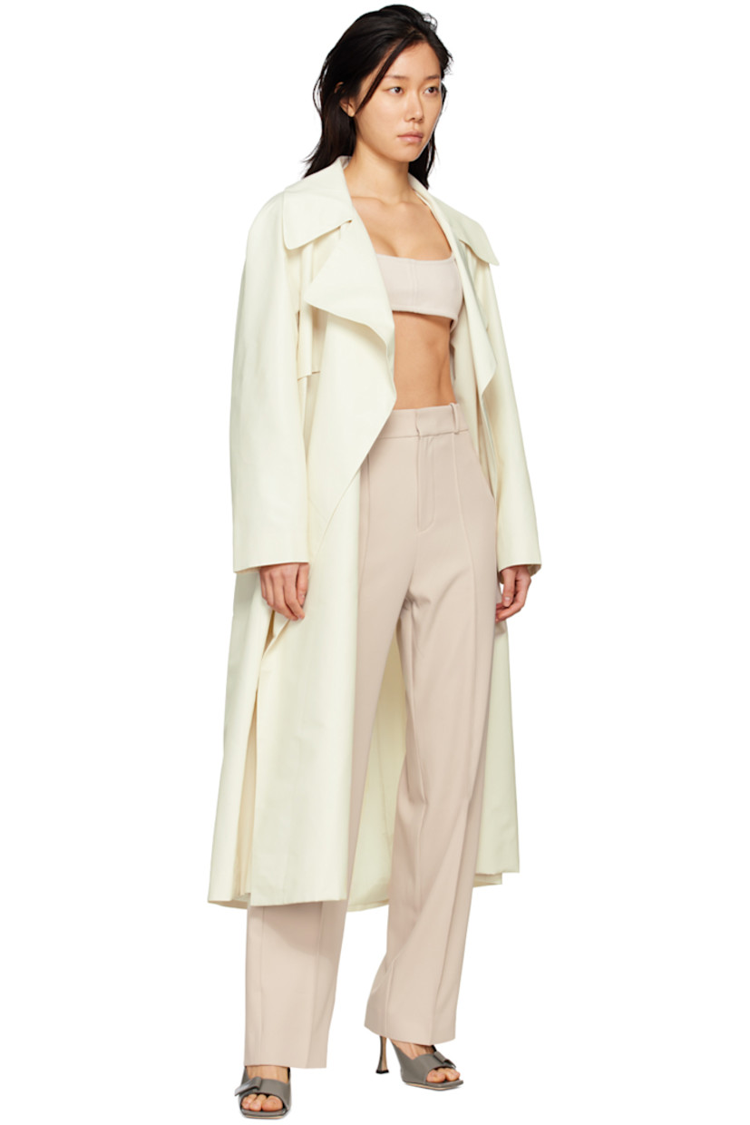 Wide-leg polyester crepe trousers.

· Belt loops
· Four-pocket styling
· Zip-fly
· Pinched seams at legs
· Darts at back waist
· Partial satin lining

Supplier color: Almond