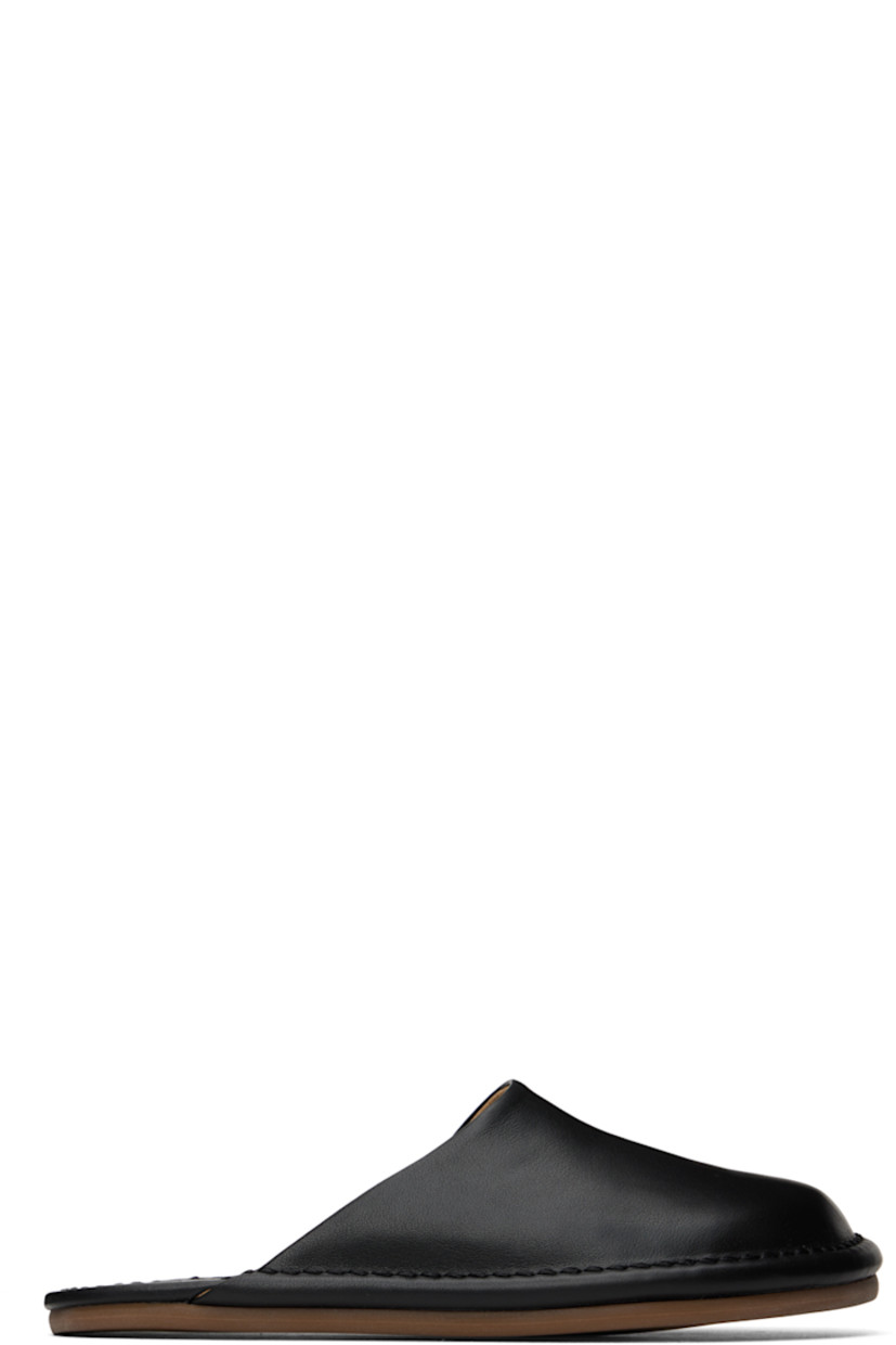 Buffed leather slippers in black.

· Leather lining
· Tonal topstitching at welt
· Rubber sole

Available exclusively at SSENSE.

Supplier color: Black