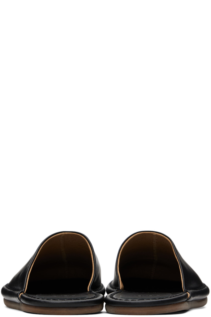 Buffed leather slippers in black.

· Leather lining
· Tonal topstitching at welt
· Rubber sole

Available exclusively at SSENSE.

Supplier color: Black