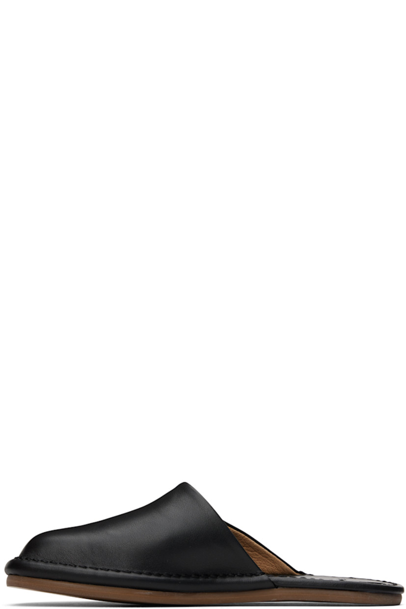 Buffed leather slippers in black.

· Leather lining
· Tonal topstitching at welt
· Rubber sole

Available exclusively at SSENSE.

Supplier color: Black