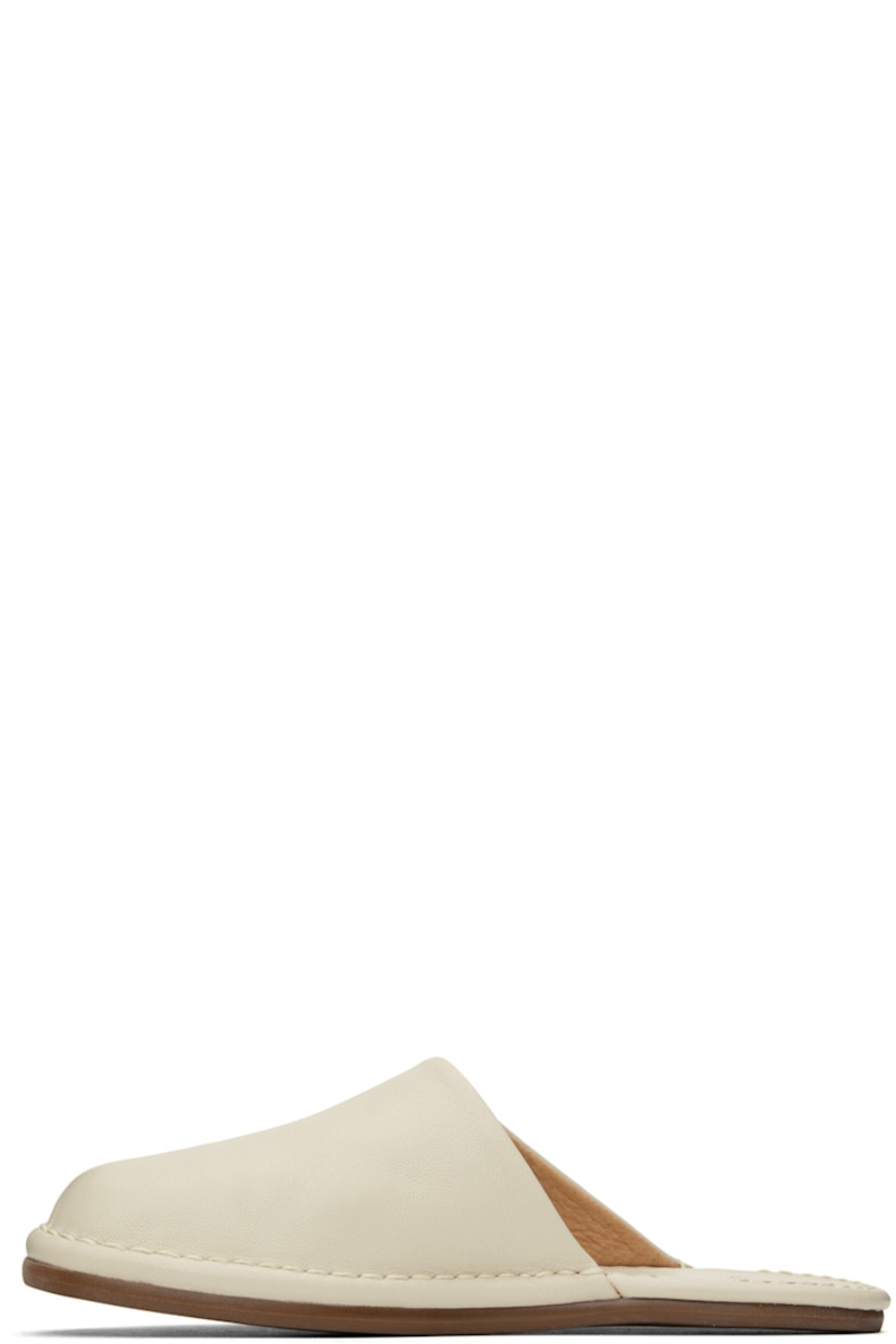 Buffed leather slippers in off-white.

· Leather lining
· Tonal topstitching at welt
· Rubber sole

Available exclusively at SSENSE.

Supplier color: Off white